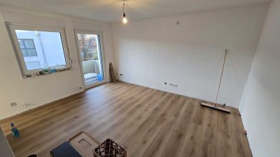 Erstbezug nach Kernsanierung: moderne 2-Zimmer-Wohnung mit Balkon & neuer EBK in ruhiger Lage