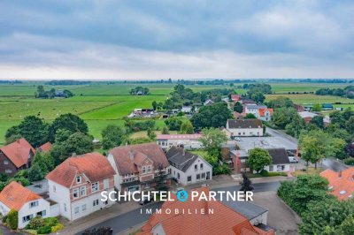 Butjadingen - Stollhamm | Spannendes Wohn- und Geschäftshaus in Bestlage