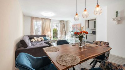 Helle und gepflegte Wohnung mit Terrasse, Garten und Tiefgaragenstellplatz