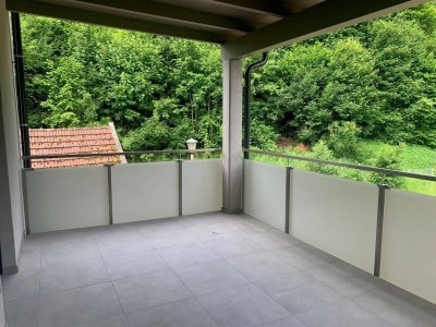 Erstbezug: Traumhafte Maisonette-Wohnung mit überdachtem Balkon und Doppelcarport
