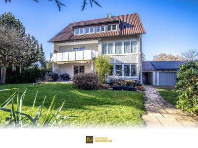 In bevorzugter Lage: Dreifamilienhaus mit großem und ebenem Garten