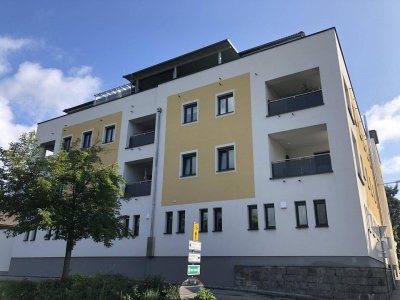 Neuwertige 2-Zimmer-Wohnung mit PKW-Stellplatz im Zentrum von Gurten