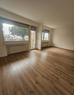 Moderne 2-Zimmer-Wohnung mit Garten & Doppelgarage in guter Lage (92 m²) Rheinnähe