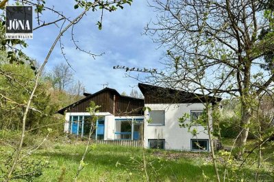 Charmantes Einfamilienhaus mit großem Potential in wunderschöner, grüner Lage