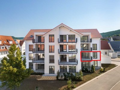 Erstbezug! Modern & großzügig: 3,5 Zimmer mit Balkon, neue Einbauküche und TG-Stellplatz