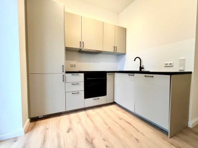 Erstbezug nach Sanierung: 2 Zi.-Whg. mit Balkon und Einbauküche im Energieeffizienzhaus