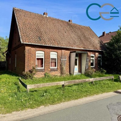 Einfamilienhaus mit großem Grundstück und viel Potenzial in zentraler Lage von Eystrup!