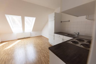 Wunderschöne Dachgeschosswohnung mit Ausblick auf den Schlossberg in zentraler Lage zu verkaufen