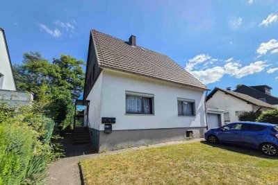 Chance ergreifen ! - Einfamilienhaus mit Anbau Einliegerwohnung und großem Grundstück in Refrath