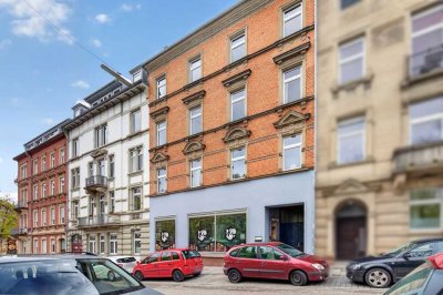 Charmante Dachgeschosswohnung mit WG-Vermietung in Top-Lage