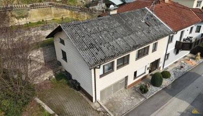 Sanierungsbedürftige Wohneinheit mit Garten, Garage &amp; viel Potenzial