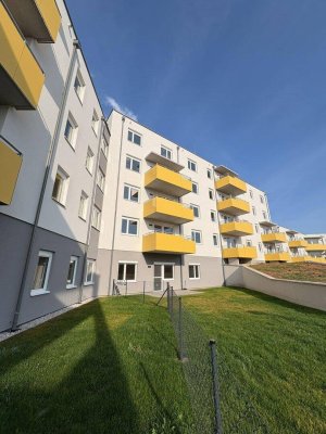 ERSTBEZUG „ein viertel grün“ - Moderne 3-Zimmer-Wohnung mit Balkon, Kellerabteil und Tiefgaragenstellplatz