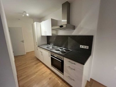 Moderne 1,5-Zimmer-Wohnung in bester Lage mit XXL-Balkon