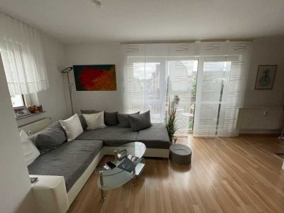 KAPITALANLAGE: Gepflegte Maisonettwohnung mit separatem Eingang, Balkon und eigenem Stellplatz