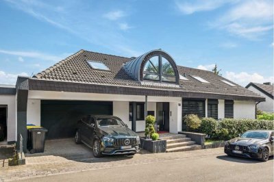 Modernisiertes Einfamilienhaus mit Wellnessbereich, Pool und großzügigem Raumkonzept