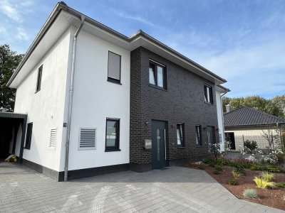 Moderne komfortable Doppelhaushälfte mit Carport und Garten in Lotte zu verkaufen