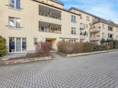 Familienfreundliche 3,5 Zimmer mit zwei Balkonen & Tiefgaragenstellplatz in gepflegtem Wohnumfeld