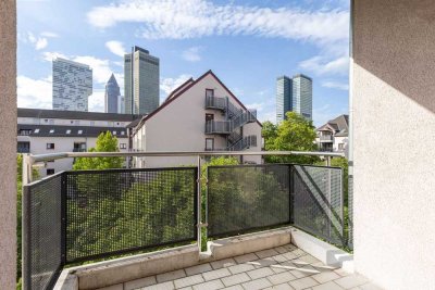 Am Puls der Metropole. Solide vermietet. Ergänzt durch Balkon und Tiefgarage.
