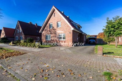 Top gepflegtes Einfamilienhaus mit Garage, Terrasse und gr. Grundstück in zentraler Lage!