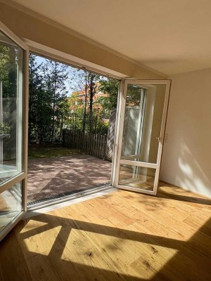 Gartenwohnung mit Reihenhauscharakter - Oase inmitten der Stadt