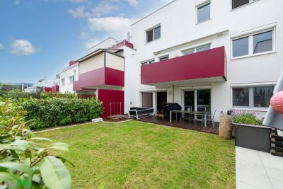 Neuwertige Gartenwohnung mit Terrasse und 2 Garagenplätze