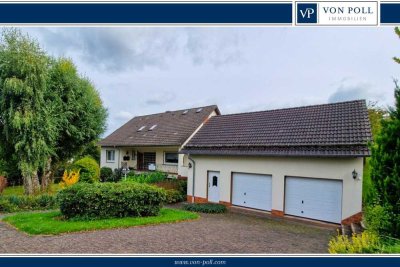 Ein-/Zweifamilienhaus mit großzügiger Garage und passendem Grundstück
