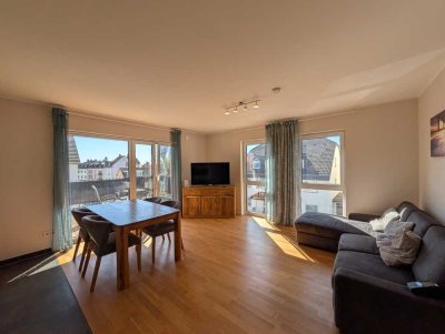 Moderne Dachgeschosswohnung mit Balkon