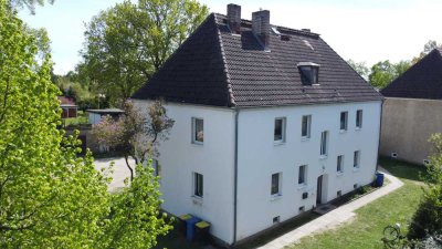 Solide Kapitalanlage mit Potenzial: Vollvermietetes 4-Parteienhaus mit Ausbaureserve im Dach