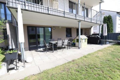 Attraktive 4-Zimmer-Erdgeschosswohnung mit großer Terrasse und Garten in perfekter Familienla