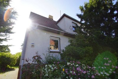 Sanierungsbedürftiges Einfamilienhaus mit Garage + Nebengelass + ca. 1.200 m² Grundstück