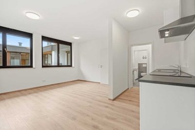 ERSTBEZUG | 2-Zi. WHG | EBK & Stellplatz | STADTNAH