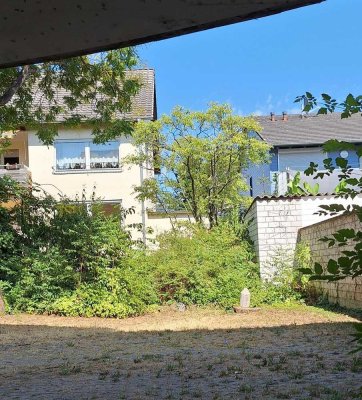 1-Zimmer-Wohnung im Gartengeschoss mit Terrasse