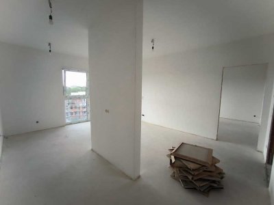 # Neubau-Dachgeschosswohnung mit Schlossblick - 2 Zimmer, großer Balkon & Einbauküche