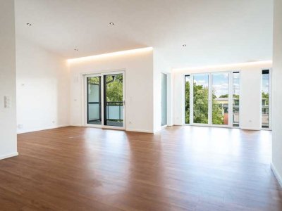 Schöne 3 Zimmer Neubau Wohnung mit Dachterasse und Carport