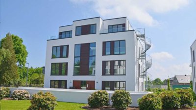 Neuwertige Obergeschosswohnung mit Tiefgaragenstellplatz, Lift, Erdwärme im Zentrum von Rastede
