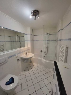 3-Zimmer-Wohnung mit 2 Bädern, großem Balkon & TG – zentral in Buchholz