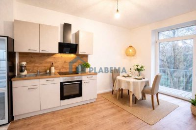 Altersgerechte Erdgeschoss-Wohnung: Balkon mit Bachflair & EBK