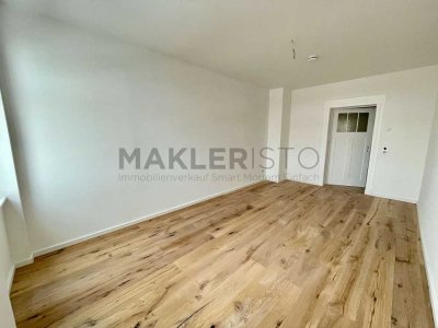 **Modernisierte 2-Zimmer-Dachgeschosswohnung mit offener Wohnküche & Fußbodenheizung**