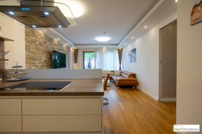 NEUER PREIS 498.000,-- € / Optimal aufgeteilte 3 Zimmer Garten Wohnung in ausgezeichneter Lage / Ruhelage