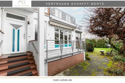 Wohnen mit Charakter: Zweifamilienhaus mit Gartenparadies und Gestaltungsfreiheit in Dreieich