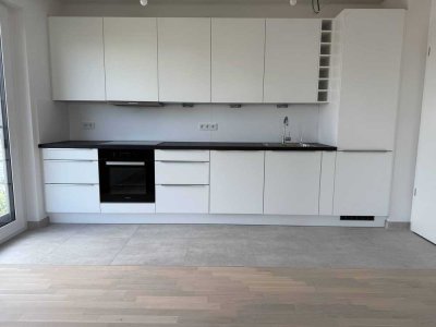 Erstbezug! Exklusive 2-Zimmer-Neubauwohnung mit Einbauküche, Walk-in Dusche & TG in Oberursel