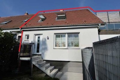 Reihenendhaus mit ca. 147 m² Wohn- und Nutzfläche,  Dachterrasse, Garage und Gartenanteil!