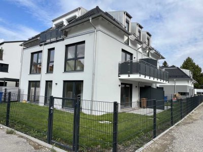 Erstbezug: 4-Zimmer-Wohnung mit Garten und Hobbyraum