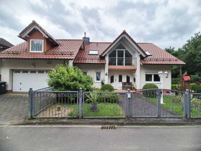 Zuhause im Grünen – Familienidyll mit Einliegerwohnung am Waldrand