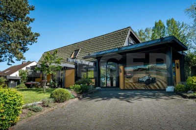 STILVOLL WOHNEN IM GRÜNEN - Freistehendes Haus mit einzigartigem Grundstück