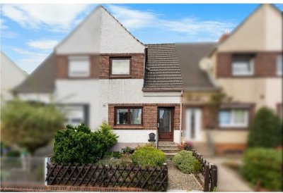 Charmantes Reihenmittelhaus mit großem Garten, Balkon & trockenem Keller