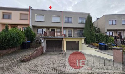 Familienfreundliches Reihenhaus mit Garage, Terrasse, Balkon und Garten in gepflegtem Umfeld