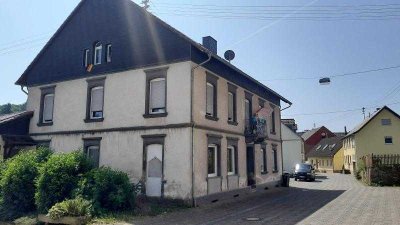 Vielseitig nutzbares Baugrundstück mit Mehrfamilienwohnhaus, Anbau und weiteren Bebauungsmöglichk...