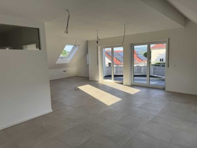 Moderne helle Dachgeschosswohnung im Erstbezug
