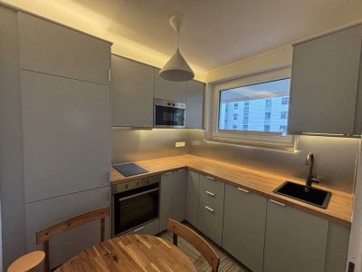 Modernisiert vollständig möblierte 2-Zimmer-Wohnung | EBK, Balkon, Keller, Gartenblick
